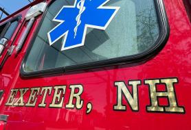 side of fire truck showing medical symbol